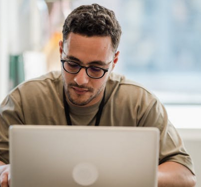 Candidate working on laptop