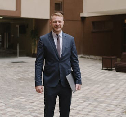 Professional candidate walking outside